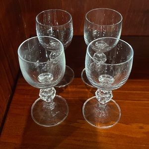Long champ toasting glasses